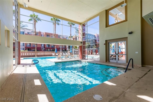 view of swimming pool featuring a patio