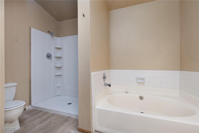 bathroom with plus walk in shower, wood-type flooring, and toilet