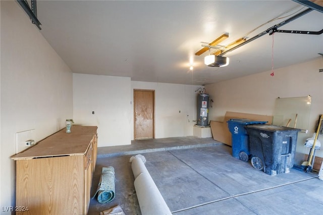 garage featuring gas water heater and a garage door opener