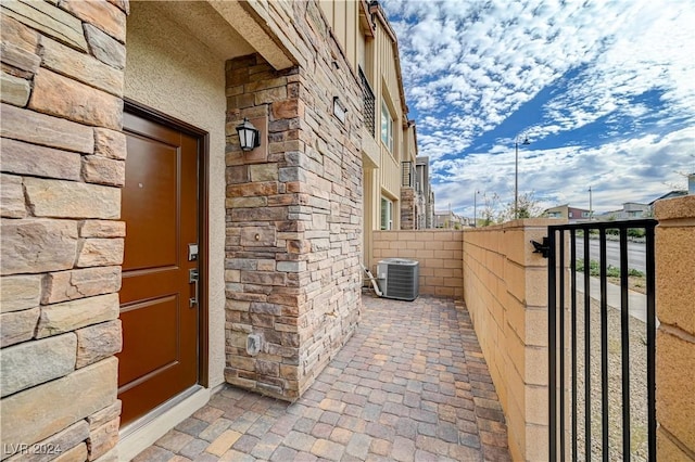 property entrance featuring central AC