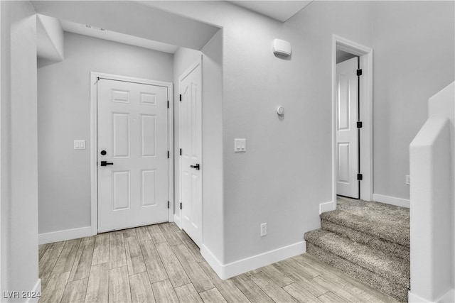 foyer with light wood-type flooring