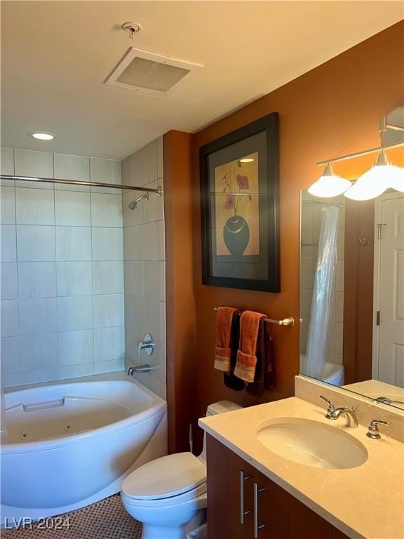 full bathroom featuring tile patterned floors, shower / bath combo, toilet, and vanity