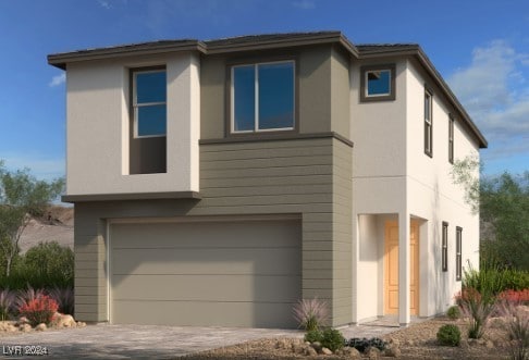 view of front of property with a garage