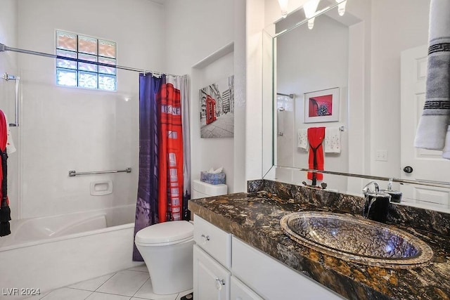 full bathroom with tile patterned flooring, vanity, toilet, and shower / bath combo with shower curtain