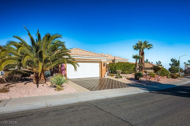 view of front of home with a garage