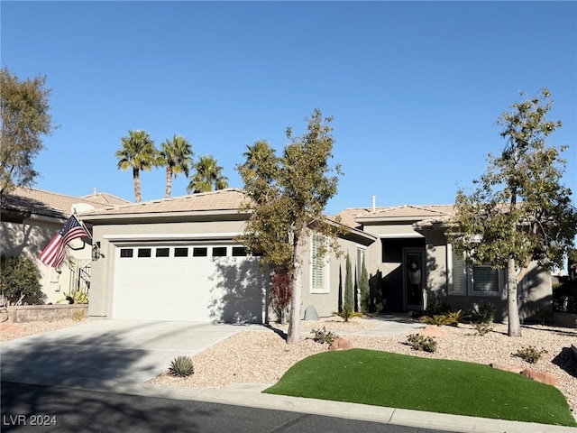 single story home with a garage