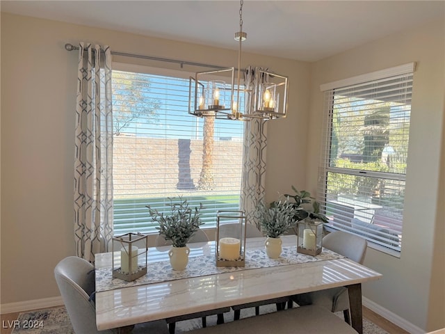 dining room featuring a notable chandelier