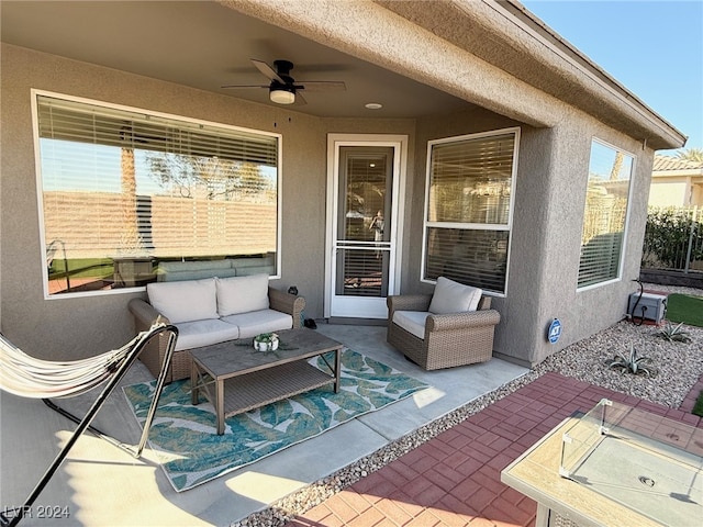 view of patio featuring outdoor lounge area and ceiling fan