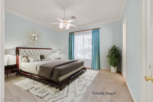 bedroom with ceiling fan, light colored carpet, and ornamental molding