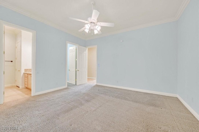 unfurnished room featuring crown molding, ceiling fan, and light colored carpet