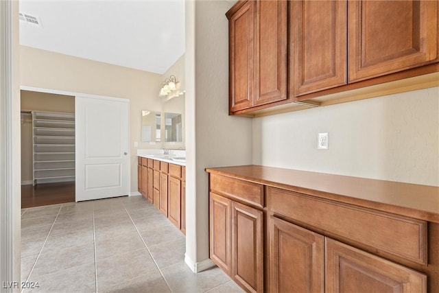 bathroom featuring vanity and tile patterned floors