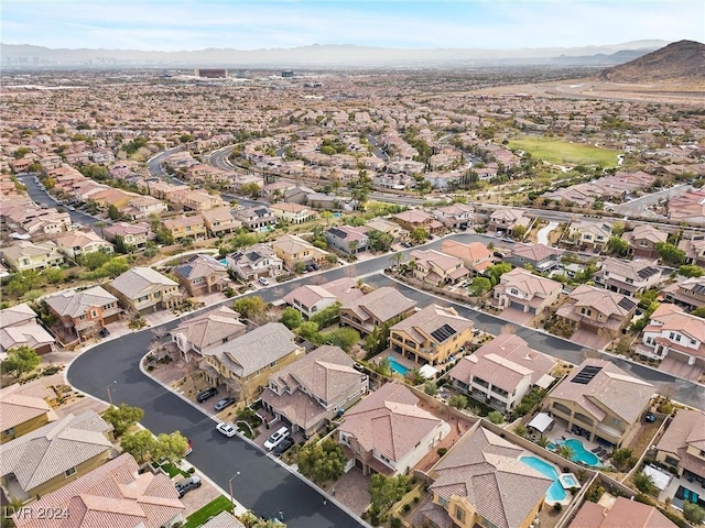 drone / aerial view featuring a mountain view