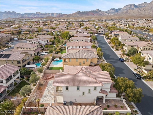 drone / aerial view featuring a mountain view