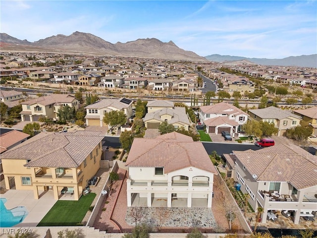 drone / aerial view featuring a mountain view