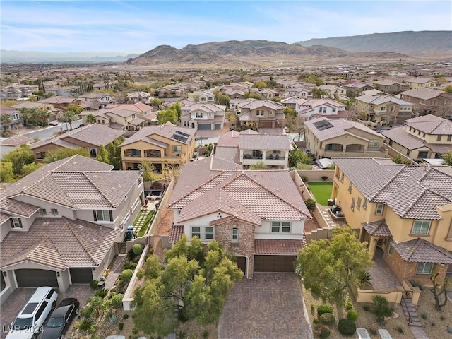 bird's eye view with a mountain view