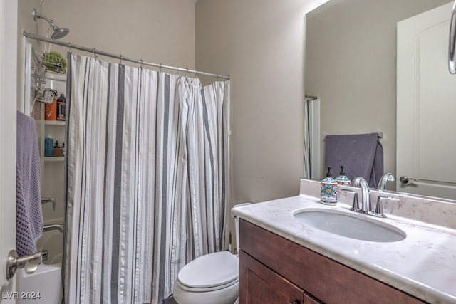 full bathroom featuring vanity, toilet, and shower / bathtub combination with curtain