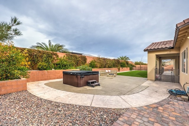 view of patio with a hot tub