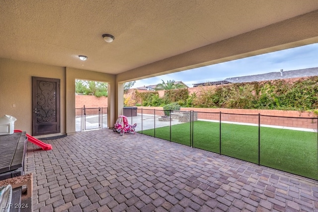 8351 Agave Bloom St, Las Vegas, NV 89131 - fenced backyard with a patio area