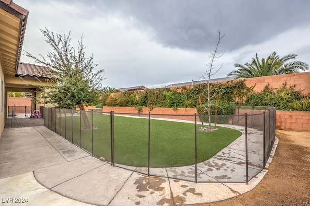 surrounding community featuring a patio