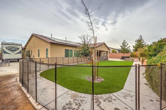 8351 Agave Bloom St, Las Vegas, NV 89131 - view of front of property with stucco siding, a tile roof, and solar panels