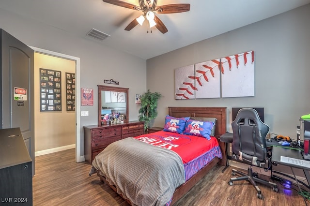 bedroom featuring ceiling fan and dark hardwood / wood-style flooring