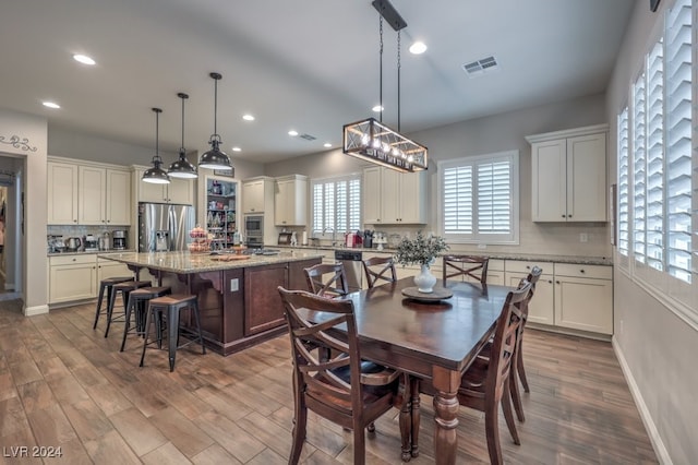 dining room featuring dark hardwood / wood-style flooring