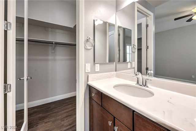8351 Agave Bloom St, Las Vegas, NV 89131 - bathroom with ceiling fan, vanity, wood finished floors, and baseboards