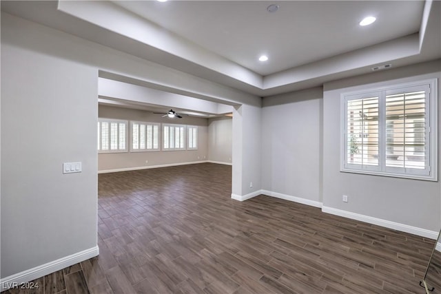 8351 Agave Bloom St, Las Vegas, NV 89131 - spare room with a raised ceiling, baseboards, dark wood-type flooring, and recessed lighting