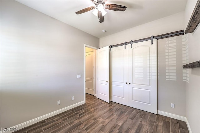 8351 Agave Bloom St, Las Vegas, NV 89131 - unfurnished bedroom with baseboards, dark wood-style flooring, and a closet