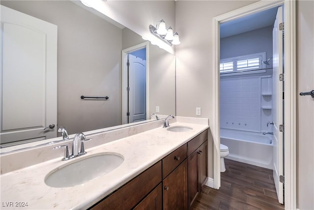 8351 Agave Bloom St, Las Vegas, NV 89131 - full bathroom featuring toilet, double vanity, wood finished floors, and shower / bath combination