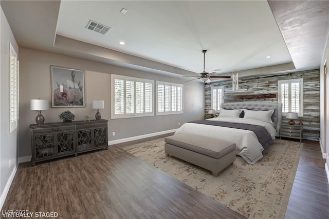 8351 Agave Bloom St, Las Vegas, NV 89131 - bedroom with baseboards, a raised ceiling, and recessed lighting