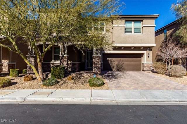 view of front of property featuring a garage