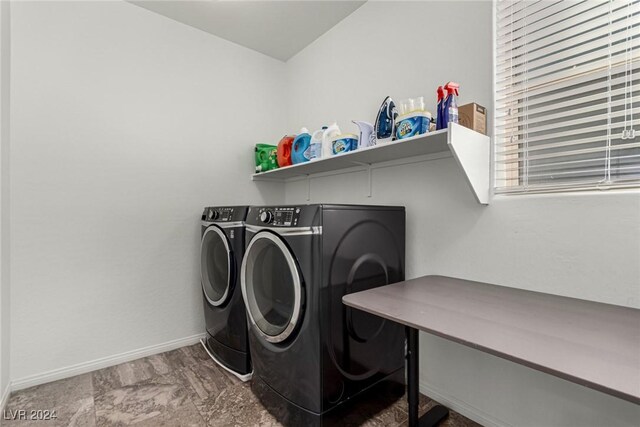 laundry room featuring independent washer and dryer