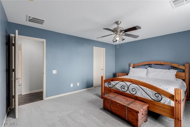 carpeted bedroom featuring ceiling fan