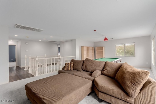 living room with hardwood / wood-style flooring and billiards