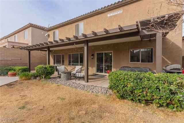 back of property featuring a patio area