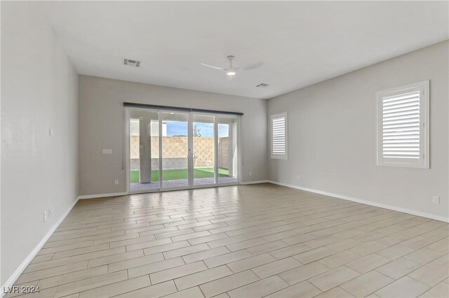 empty room featuring ceiling fan