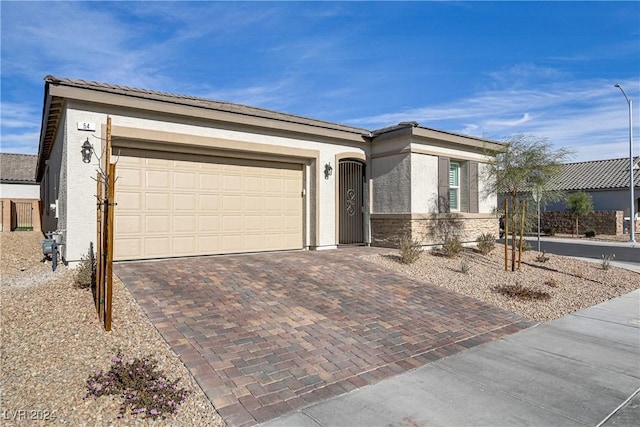 ranch-style house featuring a garage