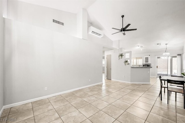 unfurnished living room featuring light tile patterned floors, visible vents, an AC wall unit, and ceiling fan