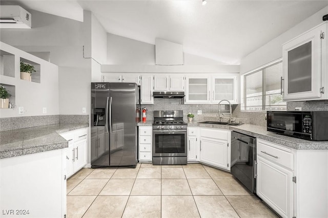 kitchen featuring light tile patterned flooring, a sink, stainless steel appliances, tile counters, and under cabinet range hood