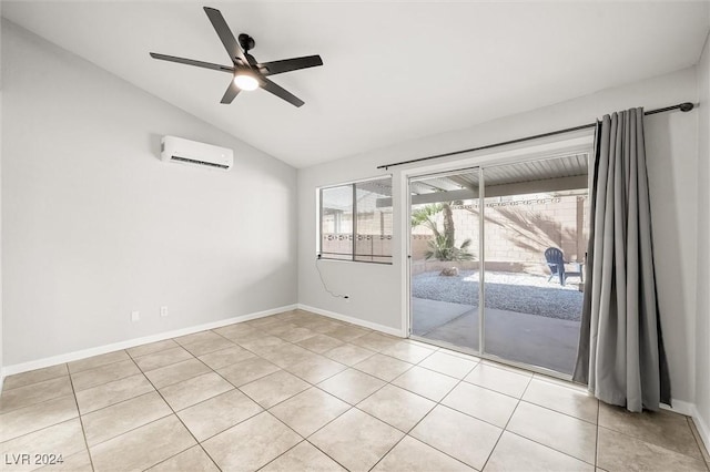 spare room with baseboards, a wall mounted air conditioner, a ceiling fan, and vaulted ceiling