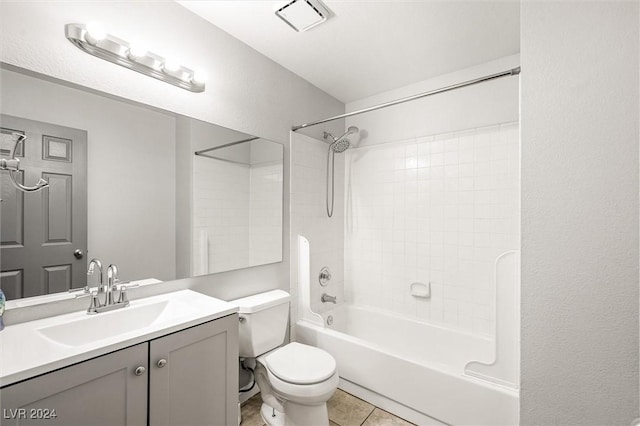 full bathroom featuring visible vents, tub / shower combination, toilet, tile patterned floors, and vanity