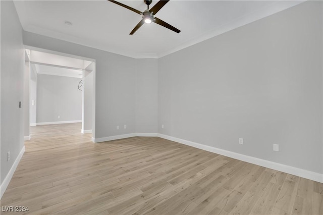 unfurnished room with ceiling fan, crown molding, and light hardwood / wood-style floors