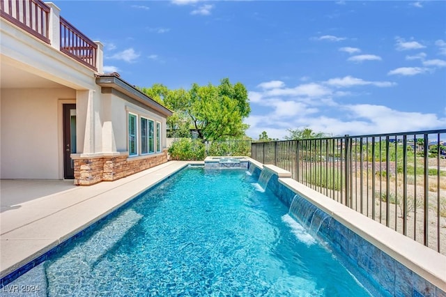 view of pool with pool water feature