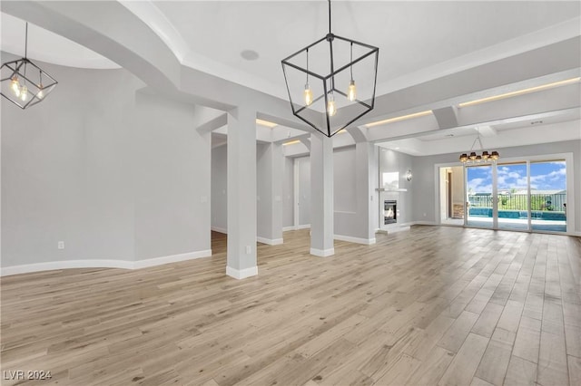 unfurnished living room with light hardwood / wood-style flooring