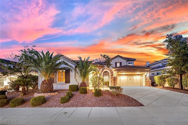 view of front of property with a garage