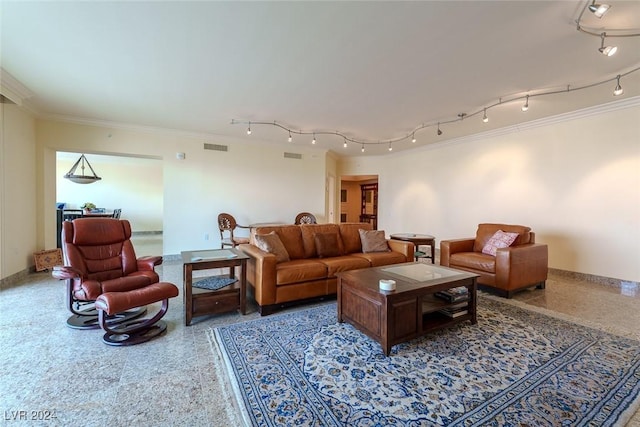 living room with ornamental molding