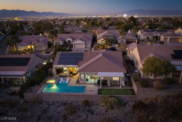 aerial view at dusk with a mountain view