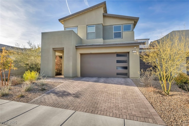 modern home featuring a garage