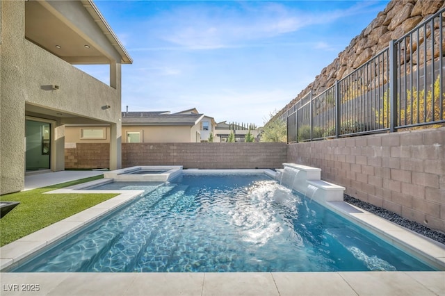 view of pool featuring an in ground hot tub